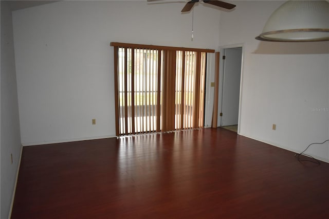 610 Swallow Ct, Apopka, FL 32712 - unfurnished room with wood finished floors, a ceiling fan, and a high ceiling