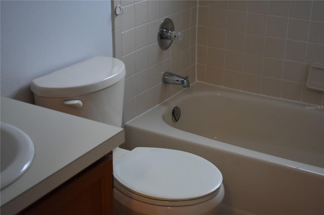610 Swallow Ct, Apopka, FL 32712 - bathroom with toilet, vanity, and  shower combination