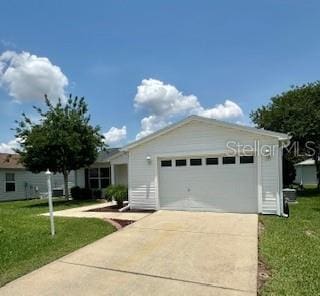 3337 Candlebrook St, The Villages, FL 32162 - ranch-style home featuring a front lawn, concrete driveway, and an attached garage