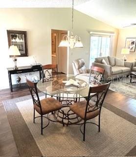 3337 Candlebrook St, The Villages, FL 32162 - dining room featuring lofted ceiling and baseboards