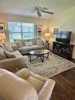 3337 Candlebrook St, The Villages, FL 32162 - living area featuring wood finished floors, ceiling fan, and a textured ceiling