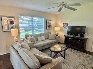 3337 Candlebrook St, The Villages, FL 32162 - living area with baseboards, ceiling fan, and wood finished floors