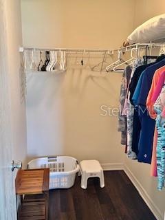 3337 Candlebrook St, The Villages, FL 32162 - walk in closet featuring wood finished floors