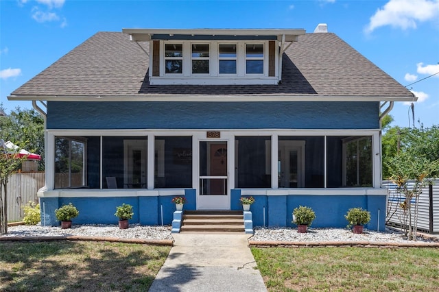 378 W Osceola St, Clermont, FL 34711 - bungalow with a sunroom and a shingled roof
