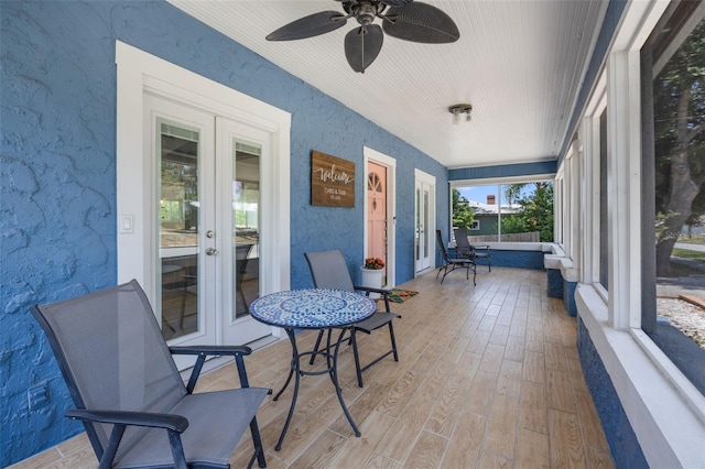 378 W Osceola St, Clermont, FL 34711 - sunroom / solarium featuring french doors, wood finished floors, and a ceiling fan