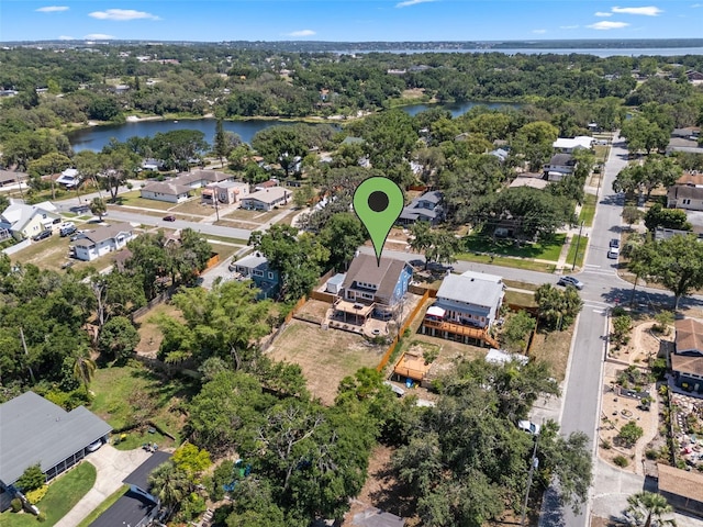 378 W Osceola St, Clermont, FL 34711 - view of property location with a nearby body of water, nearby suburban area, and a tree filled landscape