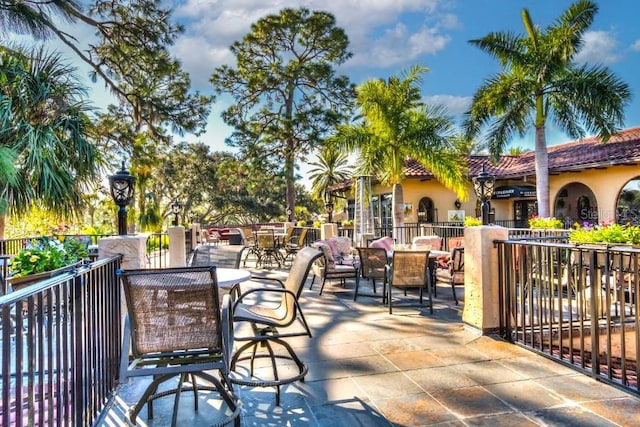 9220 San Jose Blvd, Howey In The Hills, FL 34737 - view of patio / terrace with outdoor dining area