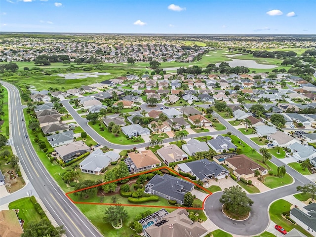 654 Poinsett Ct, The Villages, FL 32162 - aerial view of residential area with a golf club, a large body of water, and property parcel outlined
