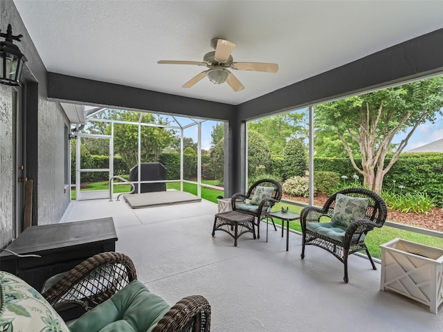 654 Poinsett Ct, The Villages, FL 32162 - sunroom with ceiling fan, plenty of natural light, and an outdoor living space
