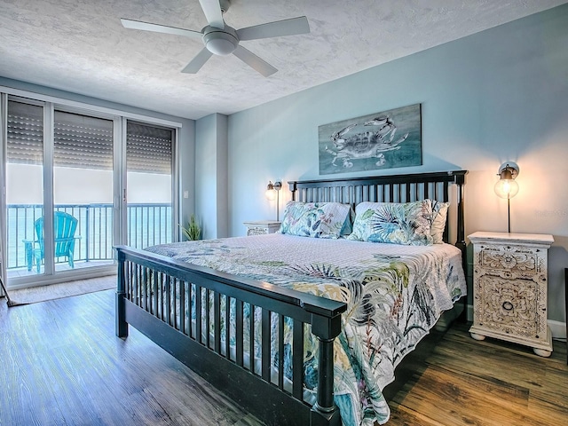 3425 S Atlantic Ave Unit 1101, Daytona Beach, FL 32118 - bedroom with access to exterior, wood finished floors, a textured ceiling, and a ceiling fan