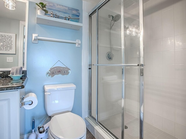 3425 S Atlantic Ave Unit 1101, Daytona Beach, FL 32118 - full bath with vanity, a stall shower, and toilet