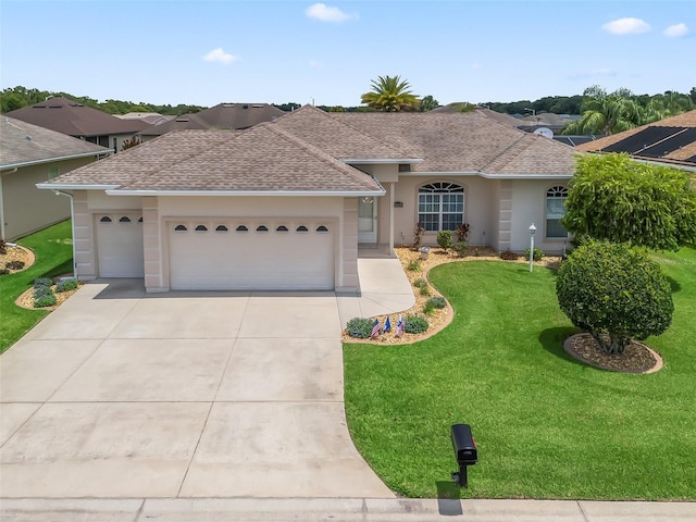 11019 SE 170th Lane Rd, Summerfield, FL 34491 - ranch-style home featuring roof with shingles, an attached garage, driveway, and a front yard