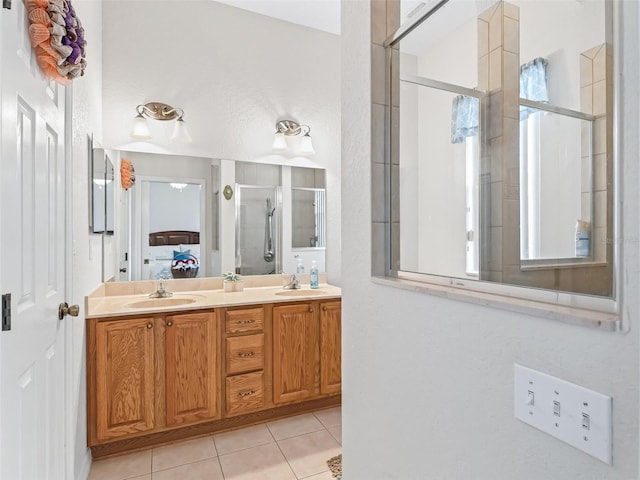11019 SE 170th Lane Rd, Summerfield, FL 34491 - ensuite bathroom with tile patterned floors, a shower with shower door, and double vanity