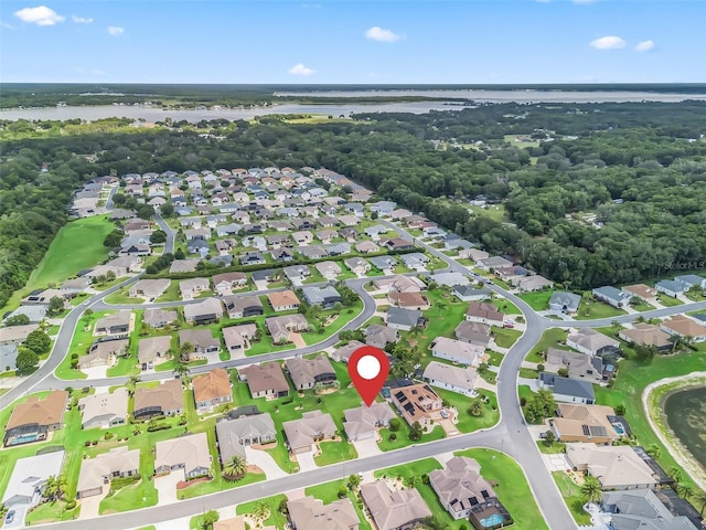 11019 SE 170th Lane Rd, Summerfield, FL 34491 - aerial perspective of suburban area with a large body of water