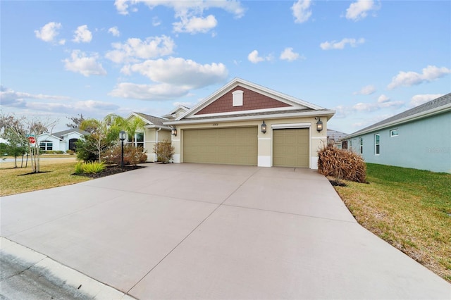 3769 Causey Ct, The Villages, FL 32163 - view of front of property featuring a front lawn, a garage, concrete driveway, and stucco siding