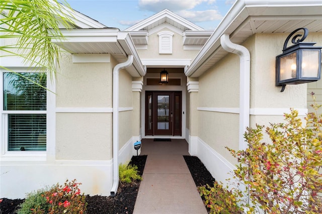 3769 Causey Ct, The Villages, FL 32163 - doorway to property featuring stucco siding