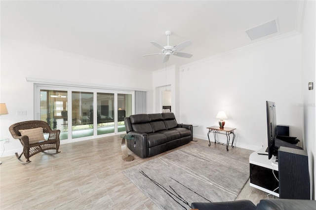 3769 Causey Ct, The Villages, FL 32163 - living room with crown molding, a ceiling fan, baseboards, and wood finished floors