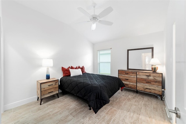 3769 Causey Ct, The Villages, FL 32163 - bedroom with lofted ceiling, light wood-type flooring, baseboards, and a ceiling fan