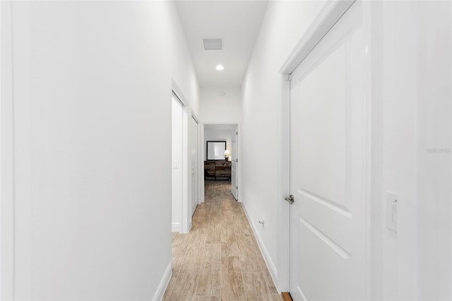 3769 Causey Ct, The Villages, FL 32163 - hall with light wood-style floors, recessed lighting, and baseboards