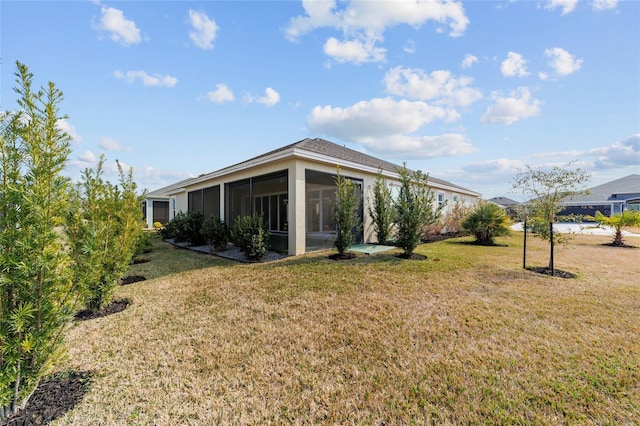 3769 Causey Ct, The Villages, FL 32163 - rear view of house featuring a yard and a sunroom