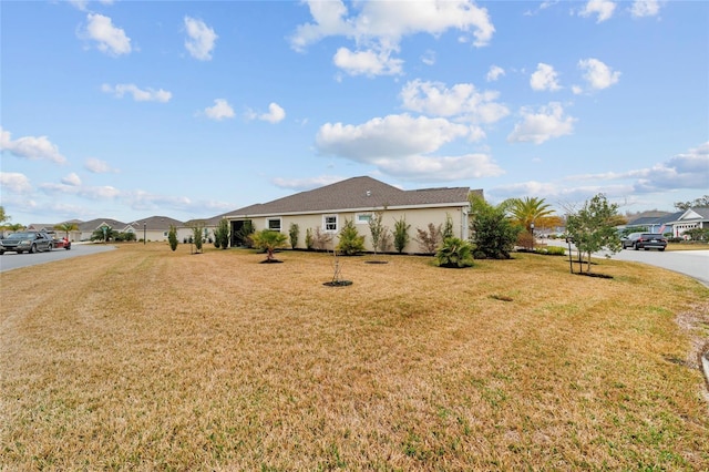 3769 Causey Ct, The Villages, FL 32163 - view of front of house with a front yard and a residential view