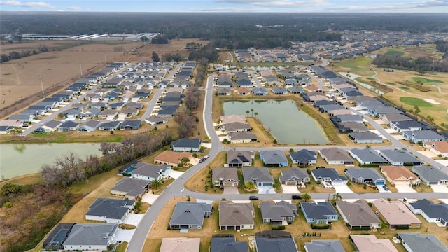 3769 Causey Ct, The Villages, FL 32163 - aerial view of property's location featuring nearby suburban area, a large body of water, and a golf course