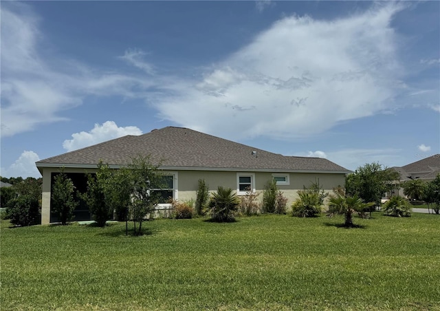 3769 Causey Ct, The Villages, FL 32163 - rear view of property with a yard and stucco siding