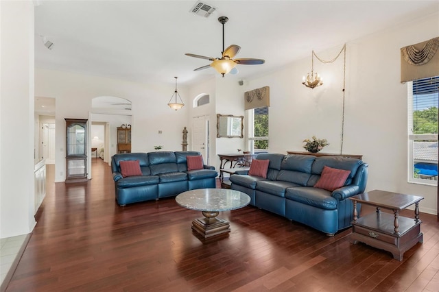 6048 Topsail Rd, Lady Lake, FL 32159 - living area featuring arched walkways, a ceiling fan, and wood finished floors