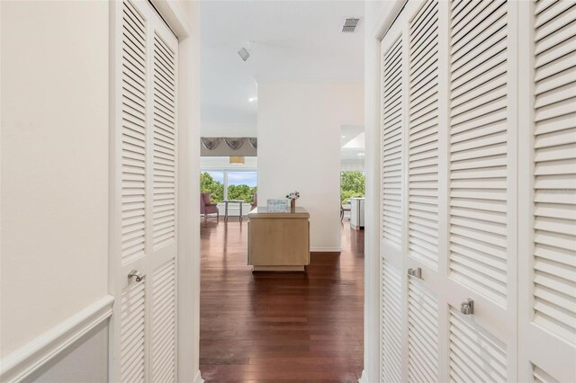 6048 Topsail Rd, Lady Lake, FL 32159 - corridor featuring dark wood-style floors