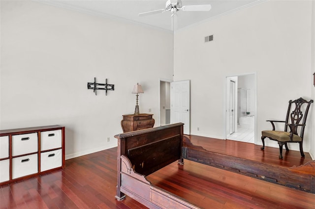 6048 Topsail Rd, Lady Lake, FL 32159 - bedroom with hardwood / wood-style floors, ornamental molding, a high ceiling, and connected bathroom