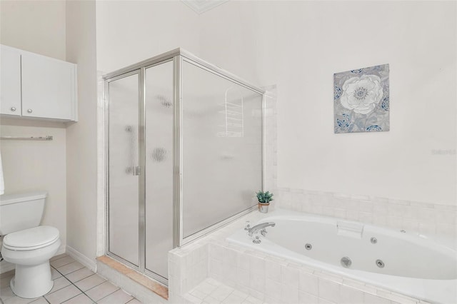 6048 Topsail Rd, Lady Lake, FL 32159 - bathroom featuring a stall shower, a jetted tub, and tile patterned flooring