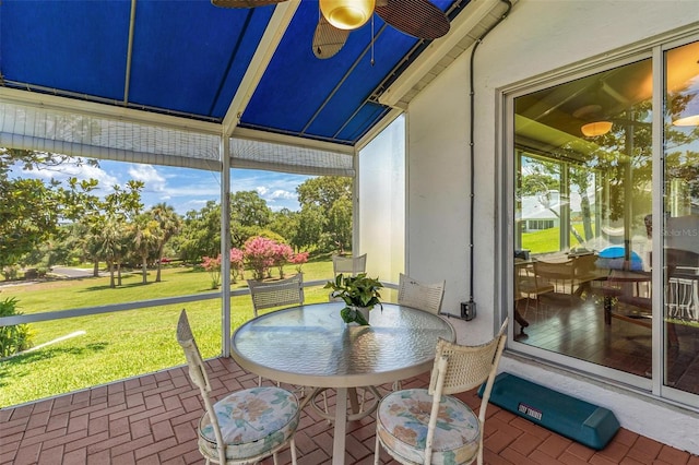 6048 Topsail Rd, Lady Lake, FL 32159 - sunroom / solarium featuring outdoor dining space and ceiling fan