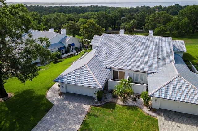 6048 Topsail Rd, Lady Lake, FL 32159 - view from above of property with a heavily wooded area