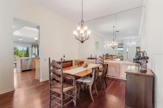 6048 Topsail Rd, Lady Lake, FL 32159 - dining area featuring a chandelier and dark wood-type flooring