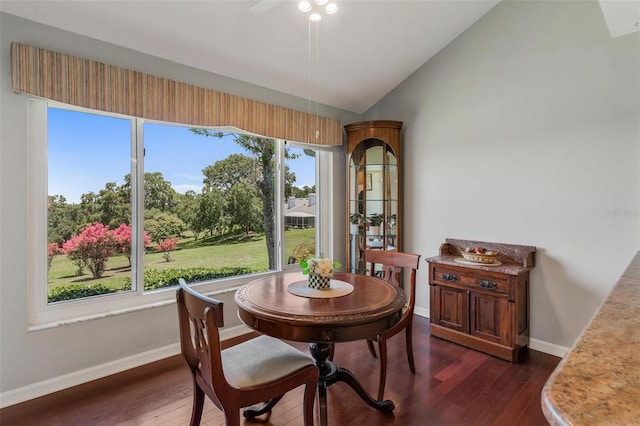 6048 Topsail Rd, Lady Lake, FL 32159 - dining area featuring vaulted ceiling, dark wood finished floors, and ceiling fan