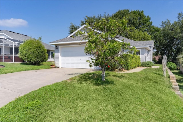 2821 Mediterranean Loop, Tavares, FL 32778 - view of front of property with concrete driveway, a front lawn, and an attached garage
