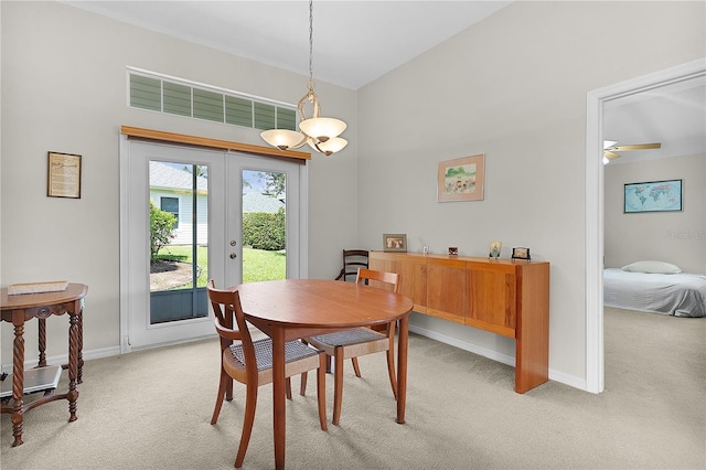 2821 Mediterranean Loop, Tavares, FL 32778 - dining room with light carpet, french doors, baseboards, and ceiling fan