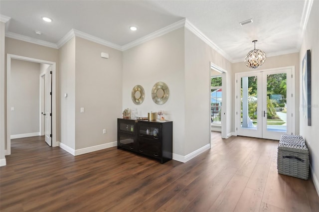 1127 Fiesta Key Cir, Lady Lake, FL 32159 - foyer with dark wood-type flooring, french doors, baseboards, a chandelier, and recessed lighting