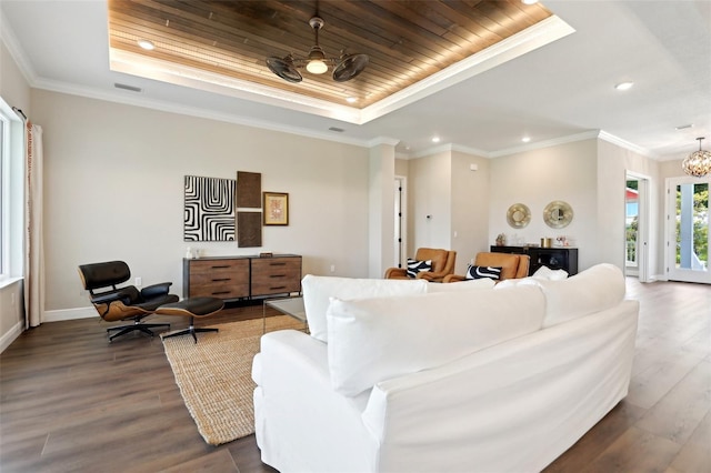 1127 Fiesta Key Cir, Lady Lake, FL 32159 - living area featuring a raised ceiling, dark wood-style floors, wood ceiling, baseboards, and recessed lighting