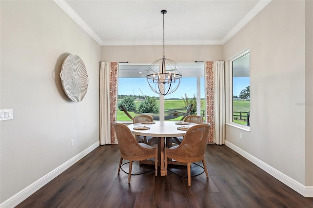 1127 Fiesta Key Cir, Lady Lake, FL 32159 - dining room with a chandelier, baseboards, dark wood-style flooring, and ornamental molding