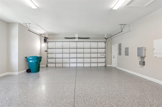 1127 Fiesta Key Cir, Lady Lake, FL 32159 - garage with electric panel and baseboards