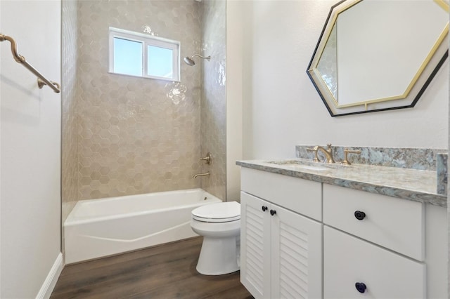 1127 Fiesta Key Cir, Lady Lake, FL 32159 - full bathroom featuring wood finished floors, vanity, bathtub / shower combination, and toilet