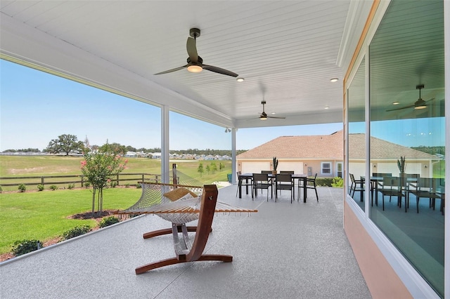 1127 Fiesta Key Cir, Lady Lake, FL 32159 - view of patio featuring outdoor dining area and a ceiling fan