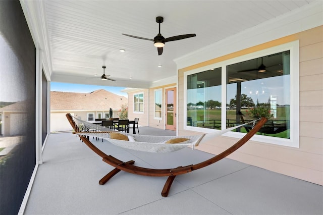 1127 Fiesta Key Cir, Lady Lake, FL 32159 - view of patio / terrace with a ceiling fan and outdoor dining area