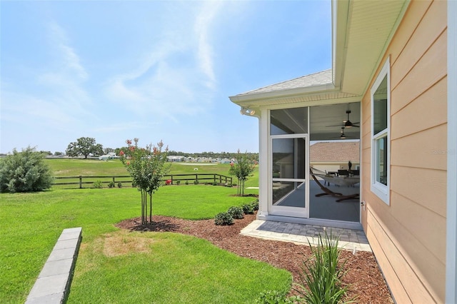 1127 Fiesta Key Cir, Lady Lake, FL 32159 - view of yard with a sunroom and a ceiling fan