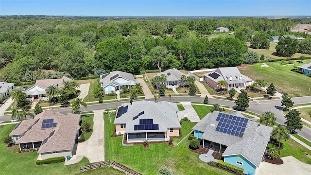 1127 Fiesta Key Cir, Lady Lake, FL 32159 - aerial view of residential area featuring a forest