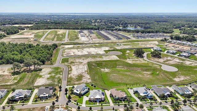 1127 Fiesta Key Cir, Lady Lake, FL 32159 - aerial view of residential area featuring a large body of water