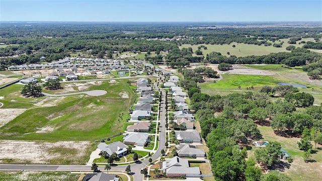 1127 Fiesta Key Cir, Lady Lake, FL 32159 - aerial view of property's location featuring nearby suburban area and a golf course