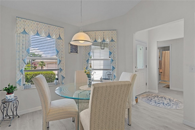 2738 Morven Park Way, The Villages, FL 32162 - dining space featuring wood finished floors, lofted ceiling, and baseboards