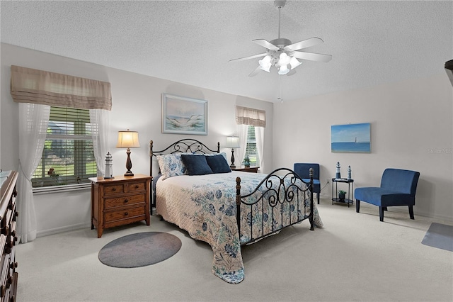 2738 Morven Park Way, The Villages, FL 32162 - carpeted bedroom featuring a textured ceiling, baseboards, and a ceiling fan